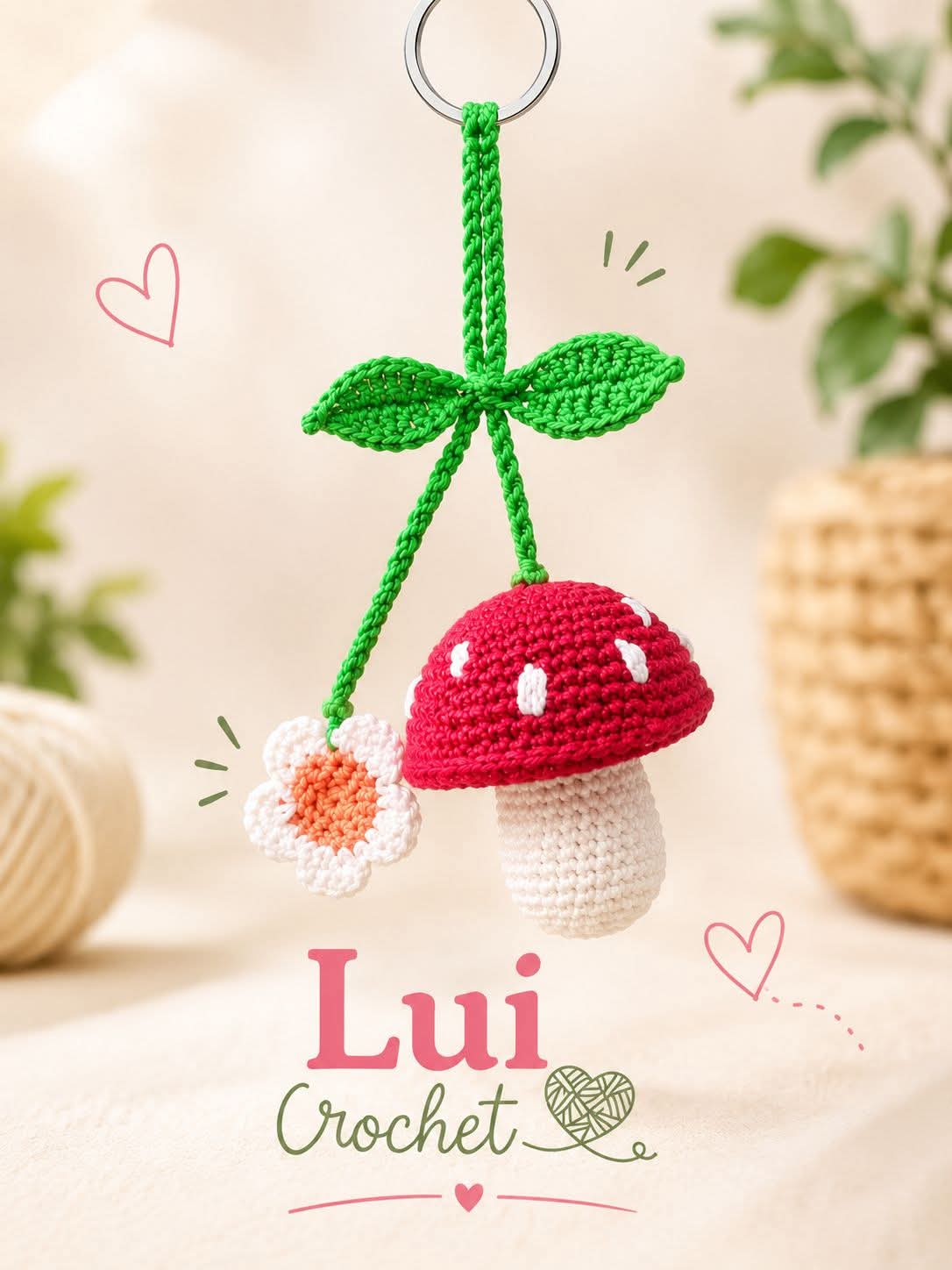 Llavero tejido en crochet con forma de hongo rojo y una margarita blanca